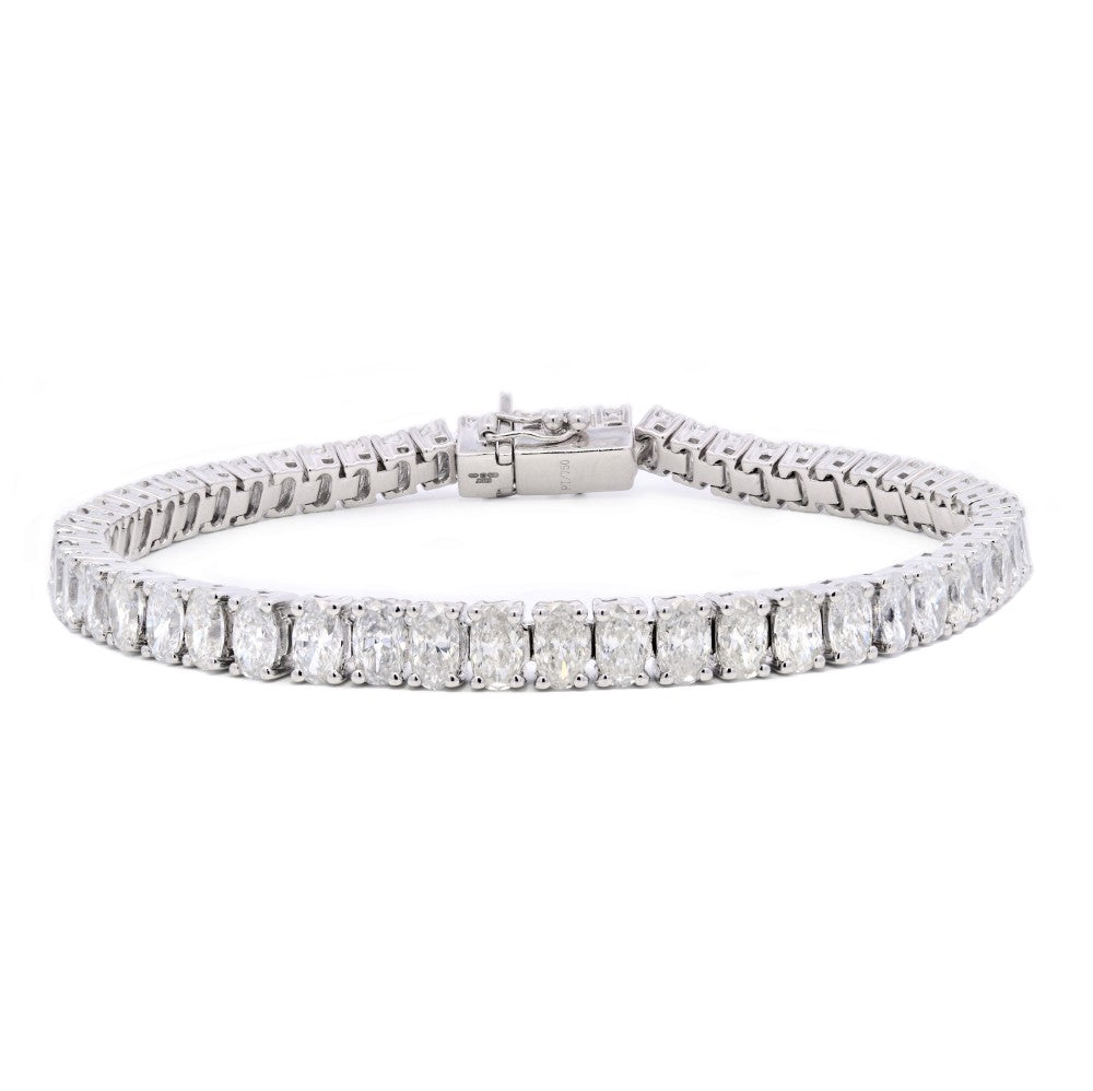 12.01ct oval cut diamond tennis bracelet, platinum & 18ct white gold, G/H colour, SI clarity
