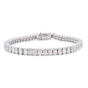 12.01ct oval cut diamond tennis bracelet, platinum & 18ct white gold, G/H colour, SI clarity