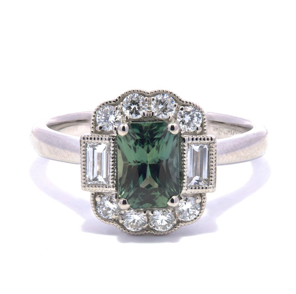 1.44ct teal sapphire & diamond engagement ring set in a platinum halo