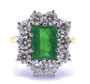 2.91ct emerald & diamond ring set in an 18ct yellow gold diamond halo