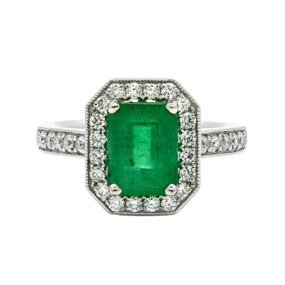 1.95ct emerald & diamond engagement ring set in a platinum halo