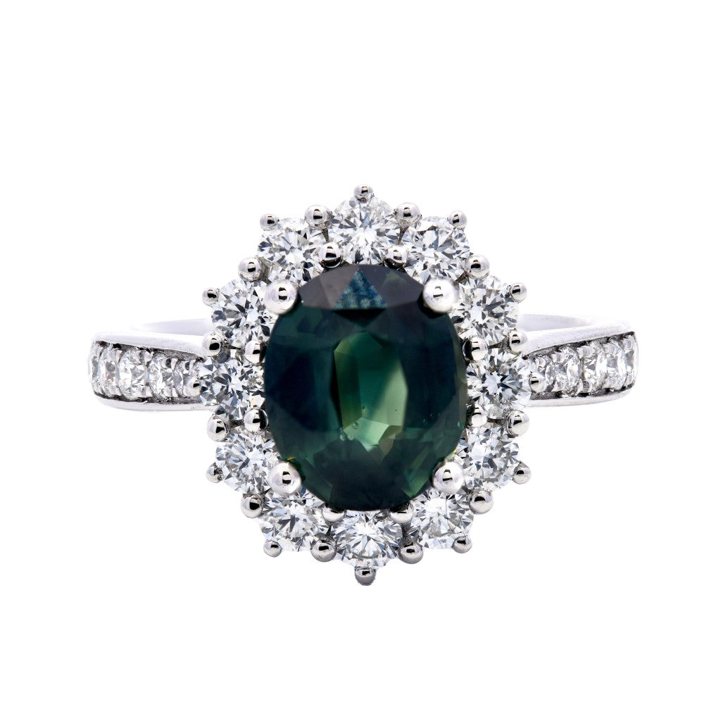2.86ct teal sapphire & diamond engagement ring set in a platinum halo
