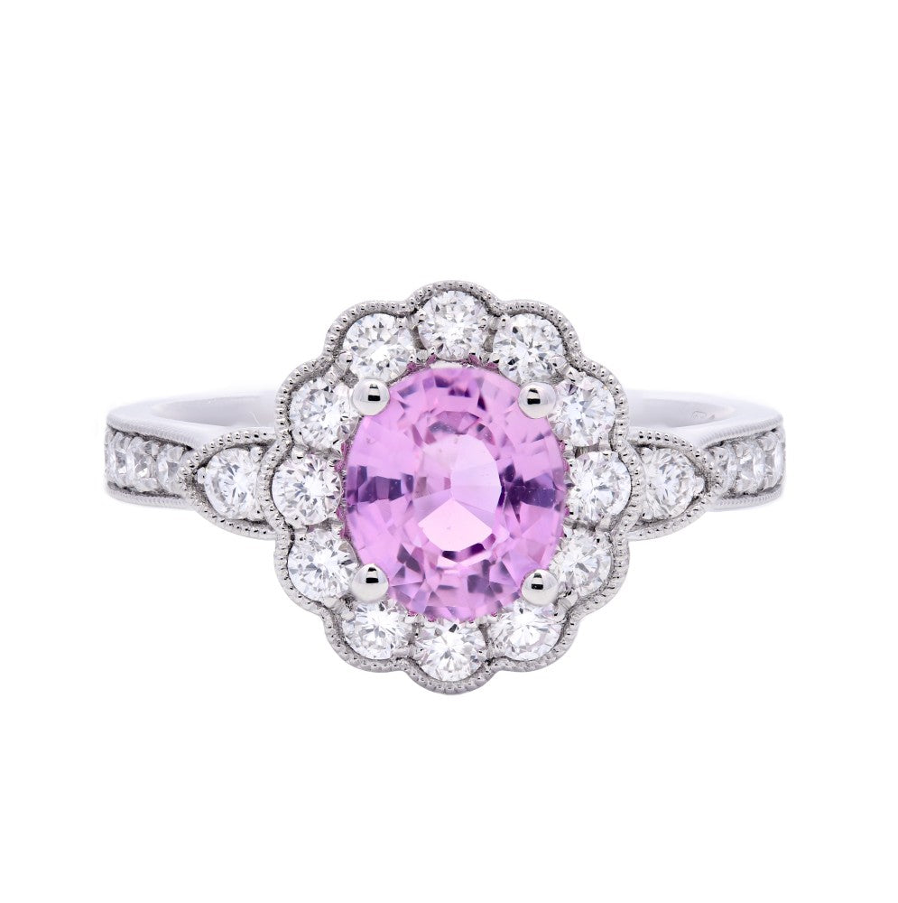 1.59ct oval cut pink sapphire & diamond engagement ring set in a platinum halo