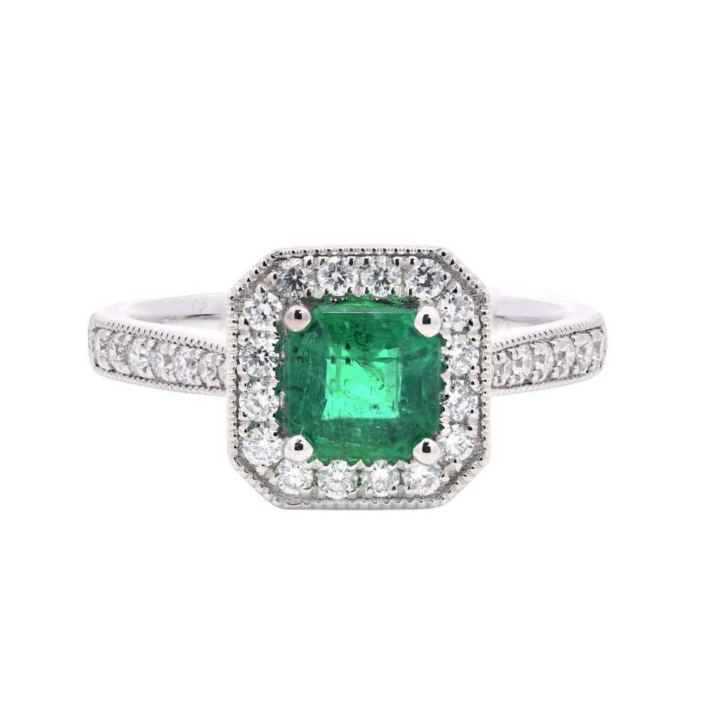 1.05ct emerald & diamond engagement ring set in a platinum halo