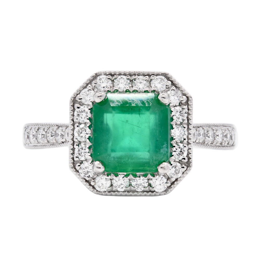 1.79ct emerald & diamond engagement ring set in a platinum halo